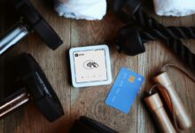 Fitness equipment beside a credit card reader and card.