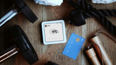 Fitness equipment beside a credit card reader and card.